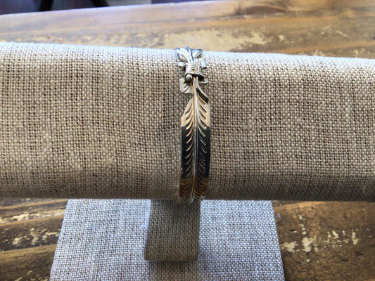 SS Feathers Tied Bracelet